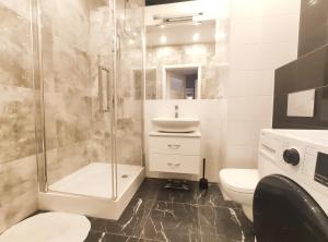 Ванная комната в Szafrana 5B by Homeprime