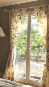 Vonkajšia záhrada v ubytovaní Petite chambre coquette