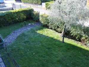 A garden outside Tranquility in the center of Lazise, neraby the lake