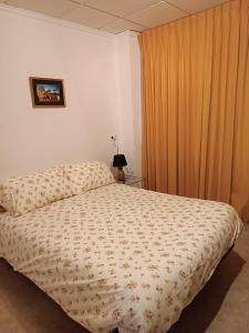 Postel nebo postele na pokoji v ubytování CAL TIO PAU