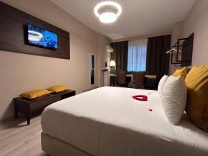 Cama ou camas em um quarto em B&B Baciami Ancora