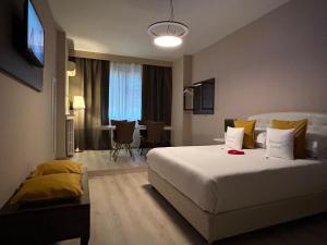 Cama ou camas em um quarto em B&B Baciami Ancora