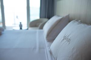 Katil atau katil-katil dalam bilik di Otantus Hotel