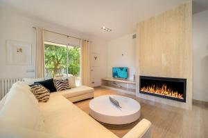 Et tv og/eller underholdning på Magnífica villa en de playa de Muro