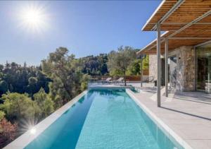 an image of a swimming pool in a house at Villa Alliopi ein Blick für die Sinne in Kranidi