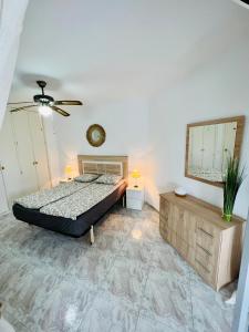 Łóżko lub łóżka w pokoju w obiekcie Sinforosa Park Apartments