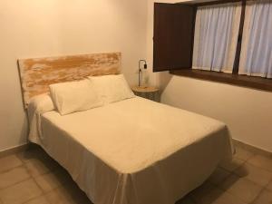 Posteľ alebo postele v izbe v ubytovaní Santa Lucía