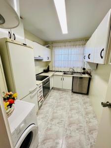 Kuchnia lub aneks kuchenny w obiekcie Sinforosa Park Apartments