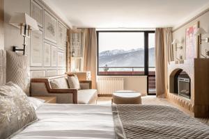 Postel nebo postele na pokoji v ubytování Bachleda Hotel Kasprowy