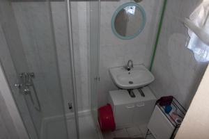 a bathroom with a shower and a sink at House by the Sea in Herceg-Novi +21 photos