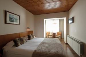 Letto o letti in una camera di Hotel Calitxo