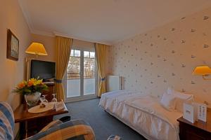 Postel nebo postele na pokoji v ubytování Hotel Meerlust