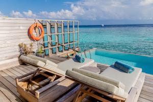 Bazén v ubytování Kagi Maldives Resort & Spa nebo v jeho okolí