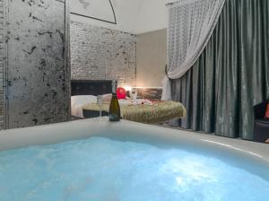 Posteľ alebo postele v izbe v ubytovaní Sicily Suite