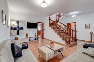 a living room with a couch and a table at Bonita Casa Arianny By Paramount Holidays in Arona