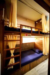Postel nebo postele na pokoji v ubytování MAPLE SOCIAL HUBZ-HOSTEL
