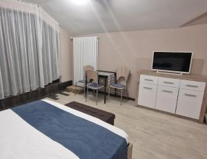 Postel nebo postele na pokoji v ubytování B55 Studio