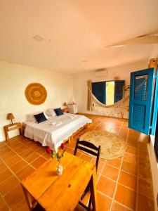 Ένα ή περισσότερα κρεβάτια σε δωμάτιο στο Montepascual Ecovillage