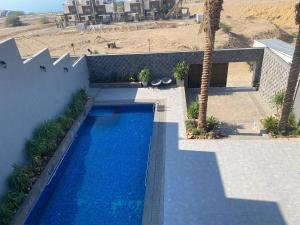 Bazén v ubytování laperla chalet villa di lusso deadsea nebo v jeho okolí