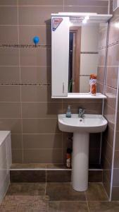 Ett badrum på APARTMENT IN BALTI LIB HOUSE