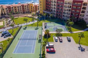 an aerial view of tennis courts in a resort at Hacienda Resort in Cabo San Lucas