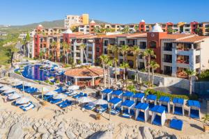 an aerial view of a resort with a pool and beach at Hacienda Resort in Cabo San Lucas