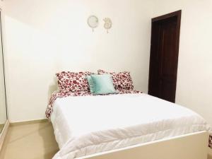 Voodi või voodid majutusasutuse Apartment in Bibijagua Beach with pool, Punta Cana toas +3 fotot