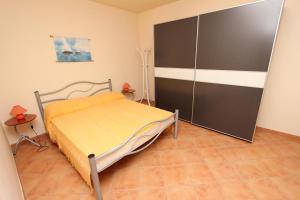 Posteľ alebo postele v izbe v ubytovaní Apartments El Corsaro