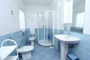 Kúpeľňa v ubytovaní Apartments El Corsaro