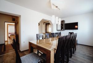 a dining room with a table and chairs at Apartment Vanessa in Gospić