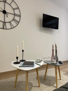 A television and/or entertainment centre at •TO ROME WITH LOVE•
