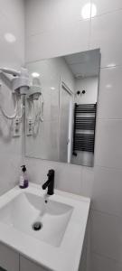 Koupelna v ubytování APARTAMENTOS TANEZ SANTURCE a + 36 fotografií