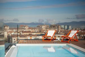 The swimming pool at or close to Kora Green City - Aparthotel Passivhaus