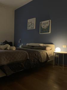 A bed or beds in a room at •TO ROME WITH LOVE•