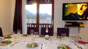 Restoran või mõni muu söögikoht majutusasutuses Bansko Prespa Ski Penthouse