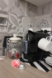 A kitchen or kitchenette at •TO ROME WITH LOVE•
