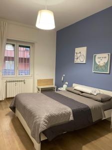 A bed or beds in a room at •TO ROME WITH LOVE•