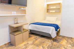 Postel nebo postele na pokoji v ubytování Hotel Salinero - Zipaquirá