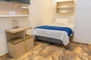 Postel nebo postele na pokoji v ubytování Hotel Salinero - Zipaquirá