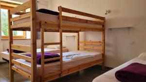 a bunk bed room with two bunk beds at La Grange Saint-Jacques in Bach