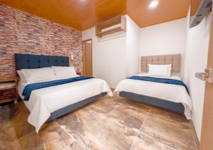 Postel nebo postele na pokoji v ubytování Hotel Salinero - Zipaquirá