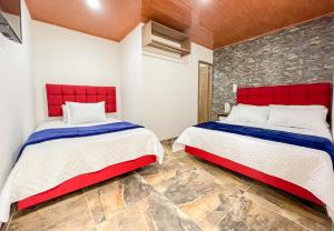 Postel nebo postele na pokoji v ubytování Hotel Salinero - Zipaquirá + 37 fotografií