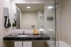 Ванная комната в Melia Setubal