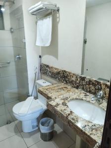 Un baño de Flat Suite Natal