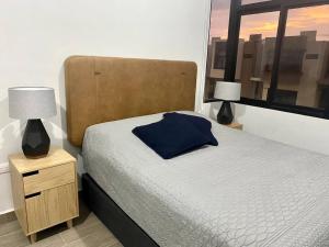 Ένα ή περισσότερα κρεβάτια σε δωμάτιο στο Casa con alberca en Residencial Portovela