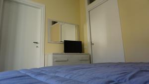 Postel nebo postele na pokoji v ubytování La Fara B&B