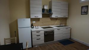 Kuchyň nebo kuchyňský kout v ubytování La Fara B&B