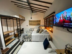 TV a/nebo společenská místnost v ubytování Casa Medallo