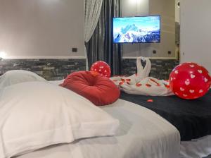 Posteľ alebo postele v izbe v ubytovaní Sicily Suite