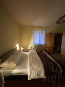Postel nebo postele na pokoji v ubytování Debatoun